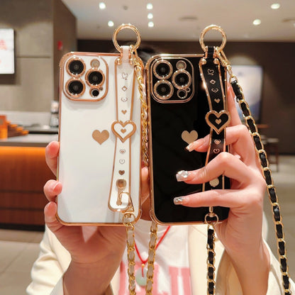 iPhone Phone Case - Dazzling Electroplated Solid Heart Accent, Stylish Heart-Shaped Wristband, Fashionable Diagonal Chain Shoulder Strap - Universally Compatible with iPhone 15, 14, 13, 12, 11 Pro, Promax, and Plus Models