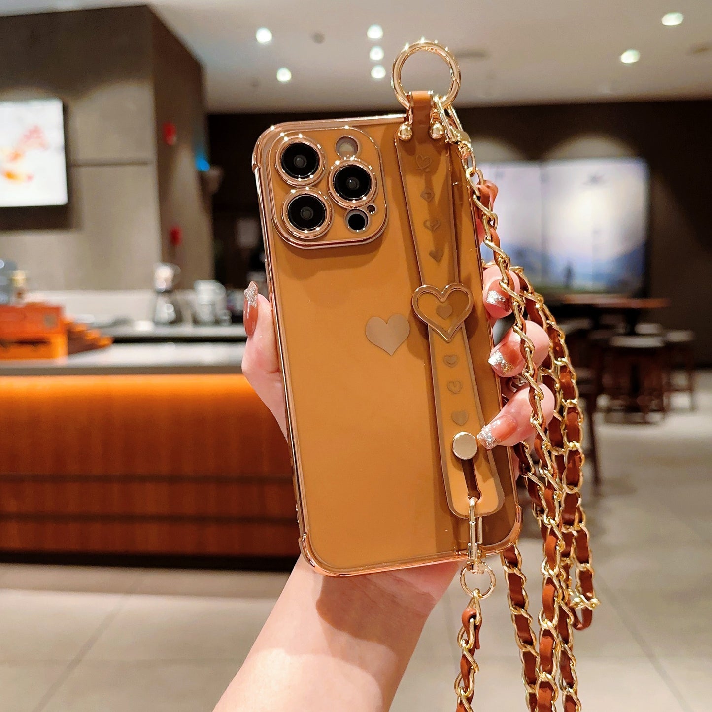 iPhone Phone Case - Dazzling Electroplated Solid Heart Accent, Stylish Heart-Shaped Wristband, Fashionable Diagonal Chain Shoulder Strap - Universally Compatible with iPhone 15, 14, 13, 12, 11 Pro, Promax, and Plus Models