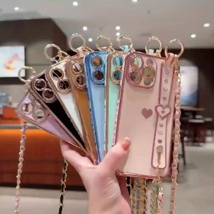 iPhone Phone Case - Dazzling Electroplated Solid Heart Accent, Stylish Heart-Shaped Wristband, Fashionable Diagonal Chain Shoulder Strap - Universally Compatible with iPhone 15, 14, 13, 12, 11 Pro, Promax, and Plus Models