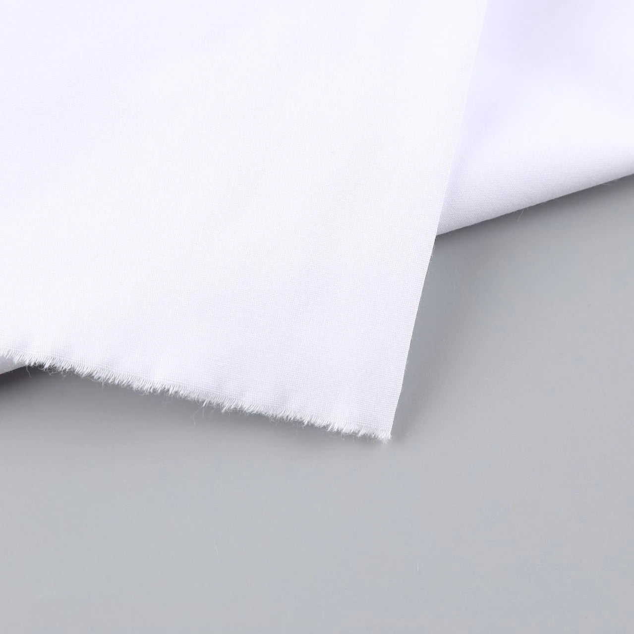 Wholesale Eco-Friendly Crystal White 130gsm 65% Polyester 35% Combed Cotton Poplin Fabric 150cm Woven for School Shirts