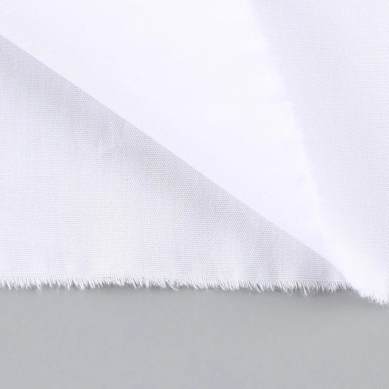 Wholesale Eco-Friendly Crystal White 130gsm 65% Polyester 35% Combed Cotton Poplin Fabric 150cm Woven for School Shirts