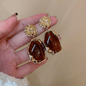 A pair of resin geometry earrings Fashion earrings Vintage irregular pendants temperament studs